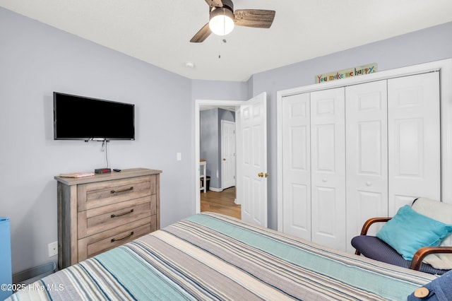 bedroom featuring a closet and ceiling fan