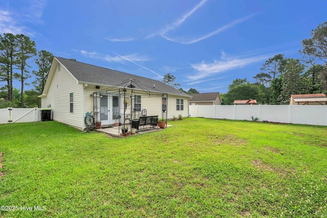 back of property featuring a patio, a gate, and french doors