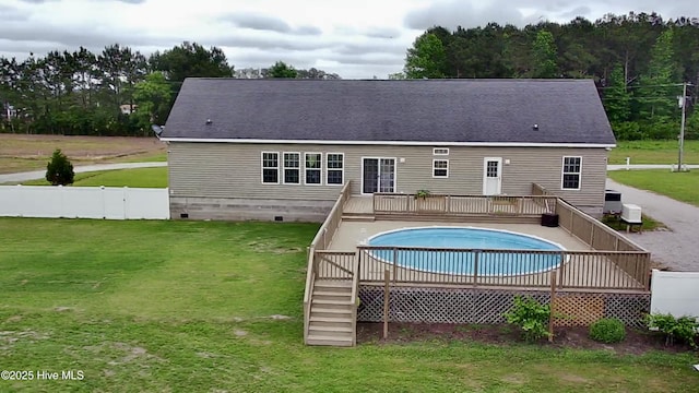 146 N Ravenwood Ln, Belhaven, NC 27810 - back of property with a wooden deck, crawl space, central AC, stairs, and roof with shingles