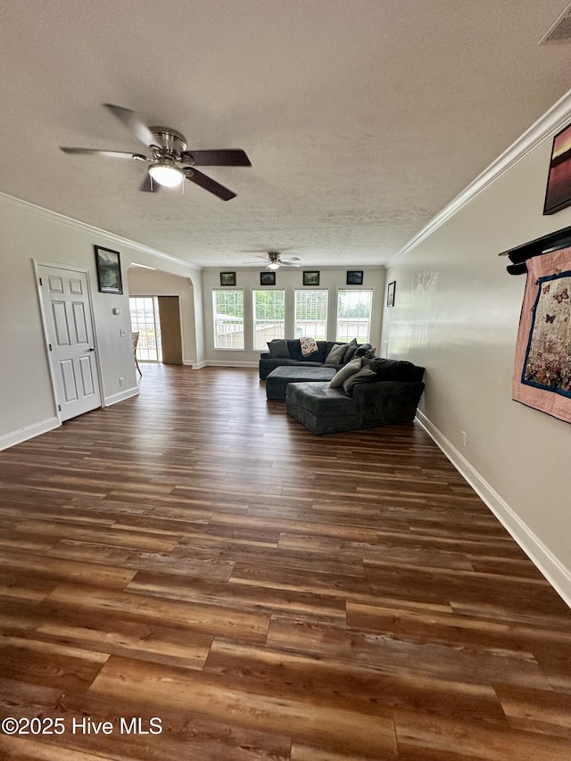 146 N Ravenwood Ln, Belhaven, NC 27810 - living area with ornamental molding, dark wood finished floors, a ceiling fan, baseboards, and a textured ceiling
