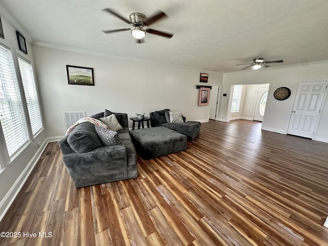 146 N Ravenwood Ln, Belhaven, NC 27810 - living area featuring ceiling fan, dark wood finished floors, baseboards, and crown molding