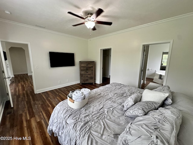 146 N Ravenwood Ln, Belhaven, NC 27810 - bedroom with crown molding, wood finished floors, baseboards, a spacious closet, and a ceiling fan