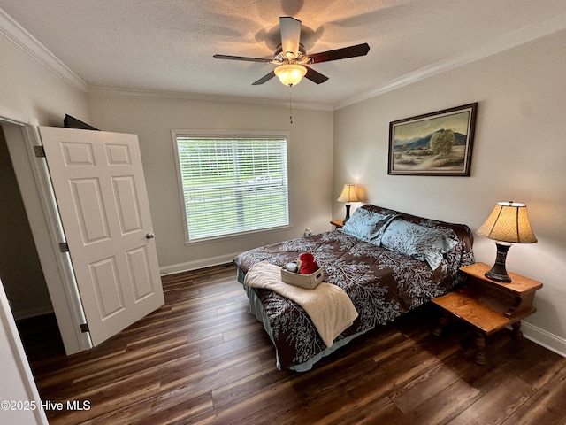 146 N Ravenwood Ln, Belhaven, NC 27810 - bedroom featuring wood-type flooring, crown molding, baseboards, a textured ceiling, and ceiling fan