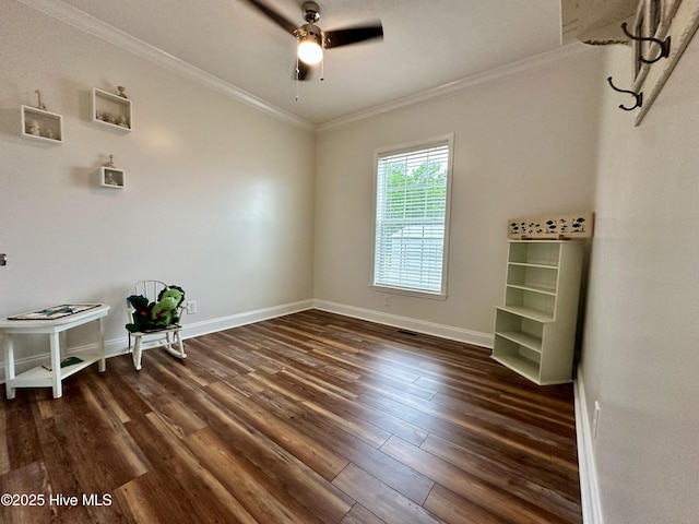 146 N Ravenwood Ln, Belhaven, NC 27810 - unfurnished room featuring dark wood-style floors, ceiling fan, baseboards, and ornamental molding