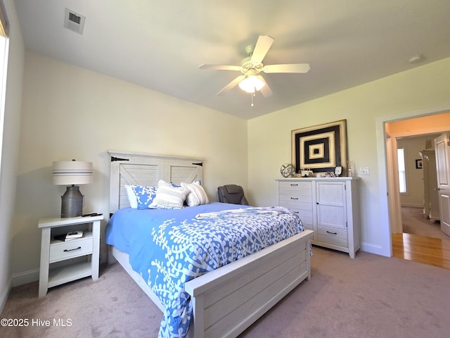 105 Argosy Dr, New Bern, NC 28560 - bedroom with light carpet, a ceiling fan, and baseboards