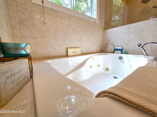 105 Argosy Dr, New Bern, NC 28560 - bathroom featuring tile walls and a tub with jets