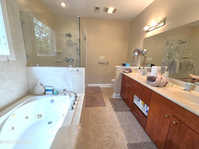 105 Argosy Dr, New Bern, NC 28560 - full bath with a tile shower, a tub with jets, double vanity, baseboards, and tile patterned flooring