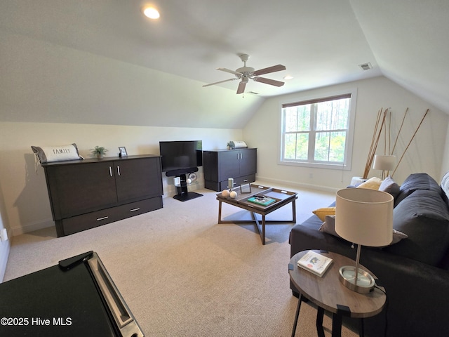 105 Argosy Dr, New Bern, NC 28560 - living area with vaulted ceiling, ceiling fan, carpet flooring, and baseboards