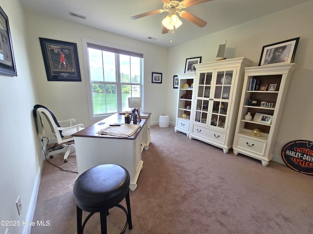 105 Argosy Dr, New Bern, NC 28560 - office with dark carpet, ceiling fan, and baseboards