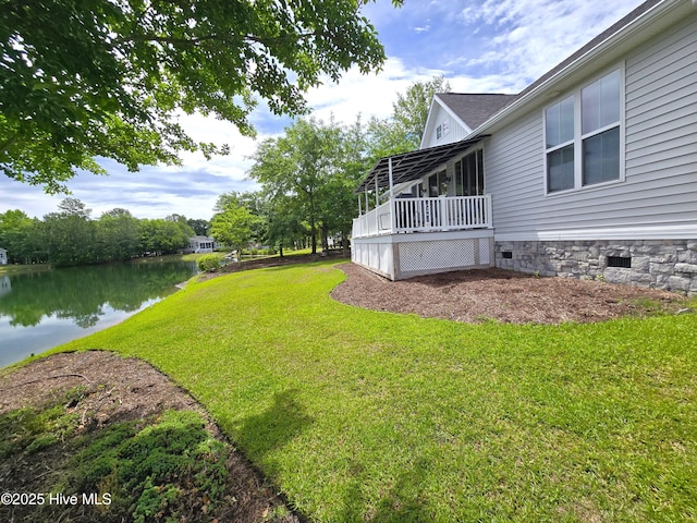 105 Argosy Dr, New Bern, NC 28560 - view of grassy yard with a deck with water view