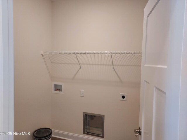 97 Hadnot Dr Unit B, Swansboro, NC 28584 - laundry area featuring hookup for an electric dryer, hookup for a washing machine, and baseboards