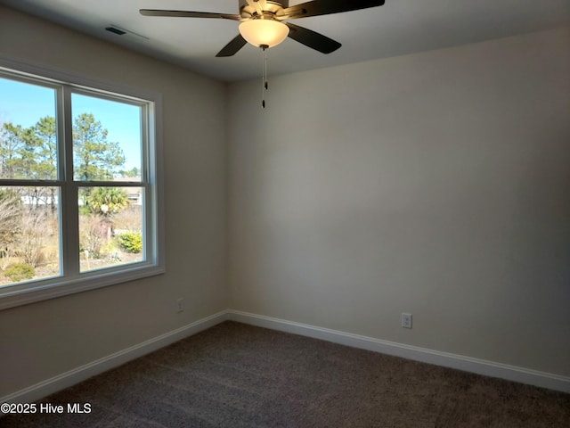 97 Hadnot Dr Unit B, Swansboro, NC 28584 - spare room with healthy amount of natural light, carpet floors, baseboards, and a ceiling fan