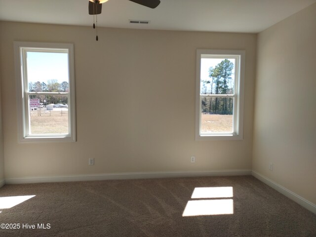 97 Hadnot Dr Unit B, Swansboro, NC 28584 - carpeted spare room with ceiling fan and baseboards