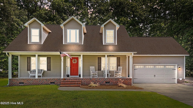 cape cod-style house featuring a porch, crawl space, driveway, an attached garage, and a front lawn