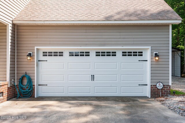 401 Cedar Ln, Washington, NC 27889 - garage with concrete driveway