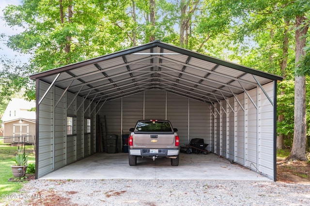 view of vehicle parking featuring a carport