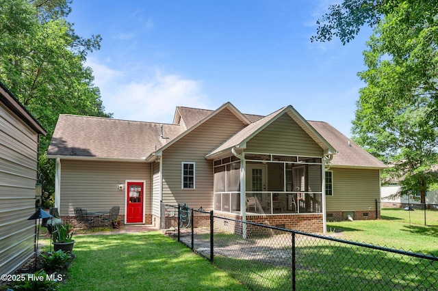 rear view of house featuring a sunroom, a shingled roof, and crawl space