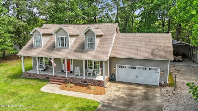 view of front of home with a porch, driveway, a front yard, a carport, and view of wooded area