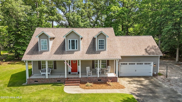 view of front of property with a porch, driveway, an attached garage, and a front yard