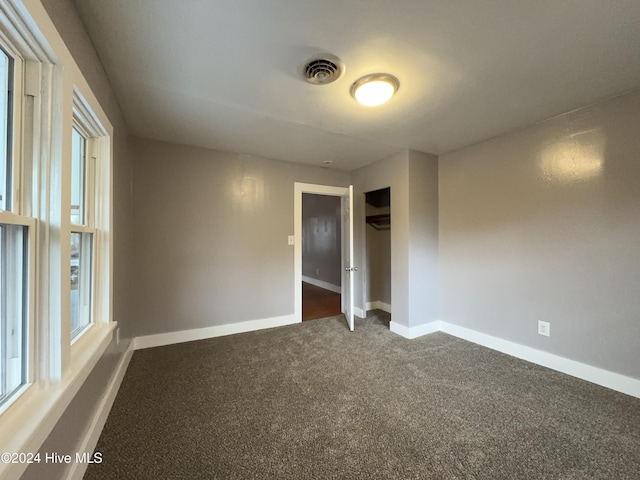 909 4th St, Elizabeth City, NC 27909 - unfurnished room with carpet and baseboards