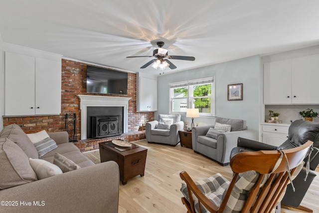 209 Inlet Dr, Wilmington, NC 28411 - living room featuring light wood-style flooring and a ceiling fan