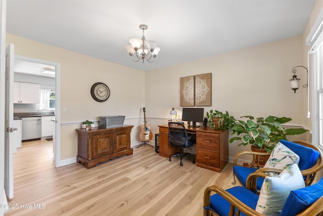 209 Inlet Dr, Wilmington, NC 28411 - office space featuring light wood finished floors and a chandelier