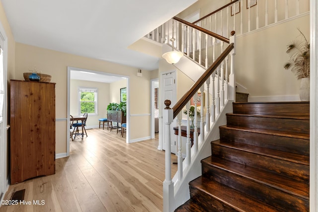 209 Inlet Dr, Wilmington, NC 28411 - stairs featuring wood finished floors and baseboards