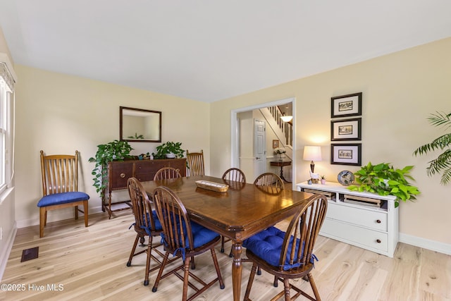 209 Inlet Dr, Wilmington, NC 28411 - dining area featuring light wood-style floors and baseboards