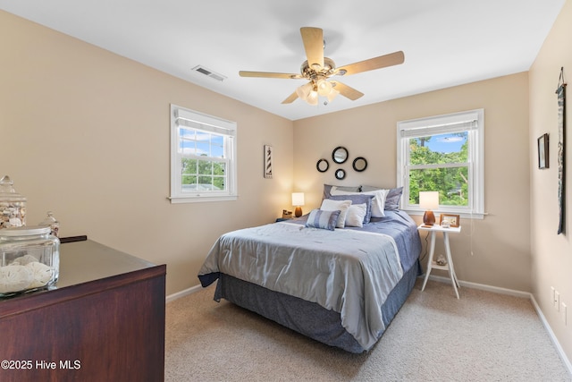 209 Inlet Dr, Wilmington, NC 28411 - bedroom featuring baseboards, light colored carpet, and a ceiling fan