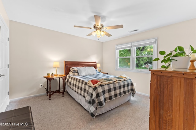 209 Inlet Dr, Wilmington, NC 28411 - bedroom with carpet floors, baseboards, and ceiling fan