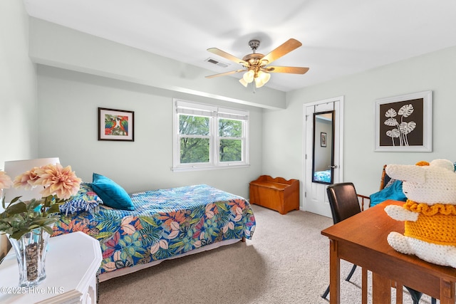 209 Inlet Dr, Wilmington, NC 28411 - bedroom featuring carpet and a ceiling fan