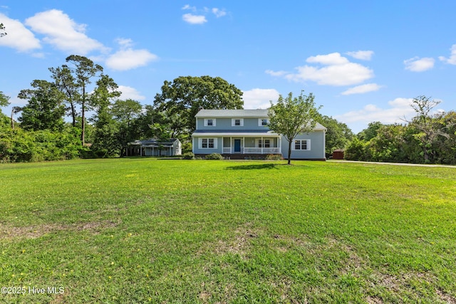 209 Inlet Dr, Wilmington, NC 28411 - back of house with covered porch and a lawn