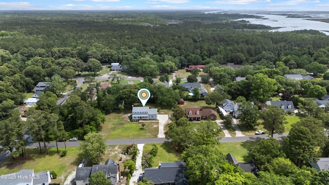 209 Inlet Dr, Wilmington, NC 28411 - aerial perspective of suburban area featuring a heavily wooded area and a large body of water