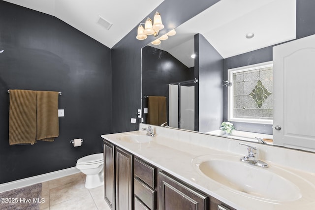 112 Norine Dr, Holly Ridge, NC 28445 - bathroom featuring lofted ceiling, tile patterned floors, toilet, a shower with shower door, and baseboards
