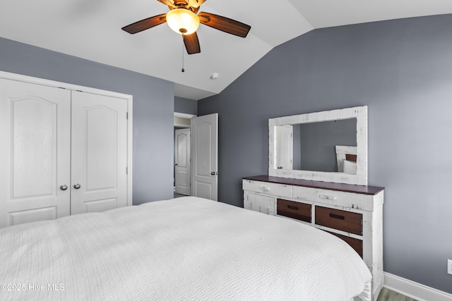 112 Norine Dr, Holly Ridge, NC 28445 - bedroom featuring lofted ceiling, a closet, baseboards, a ceiling fan, and wood finished floors