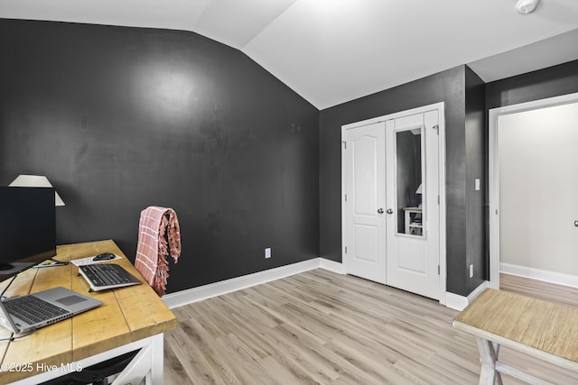 112 Norine Dr, Holly Ridge, NC 28445 - office space with light wood-type flooring, vaulted ceiling, and baseboards