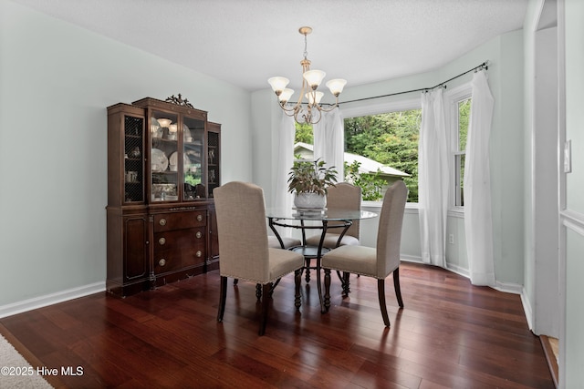807 Cheryl Ln, Wilmington, NC 28405 - dining area featuring a chandelier, wood finished floors, and baseboards