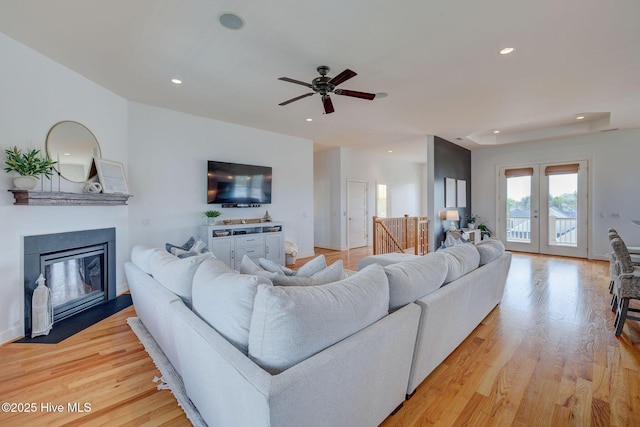 353 Spicer Lake Dr, Holly Ridge, NC 28445 - living area featuring recessed lighting, light wood-type flooring, a ceiling fan, and a fireplace with flush hearth
