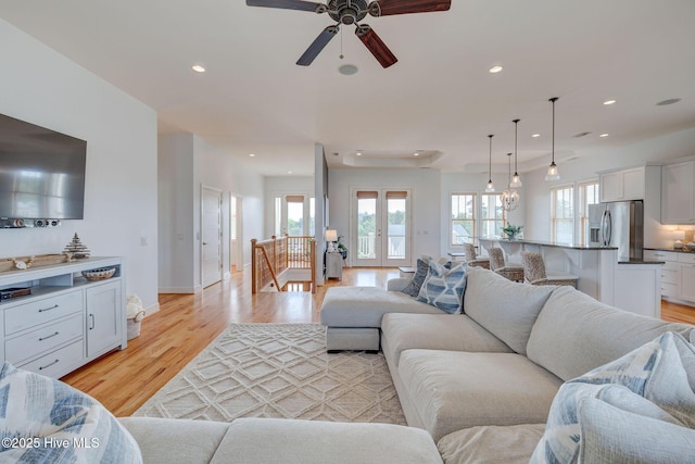 353 Spicer Lake Dr, Holly Ridge, NC 28445 - living room featuring a ceiling fan, light wood-style floors, recessed lighting, and baseboards
