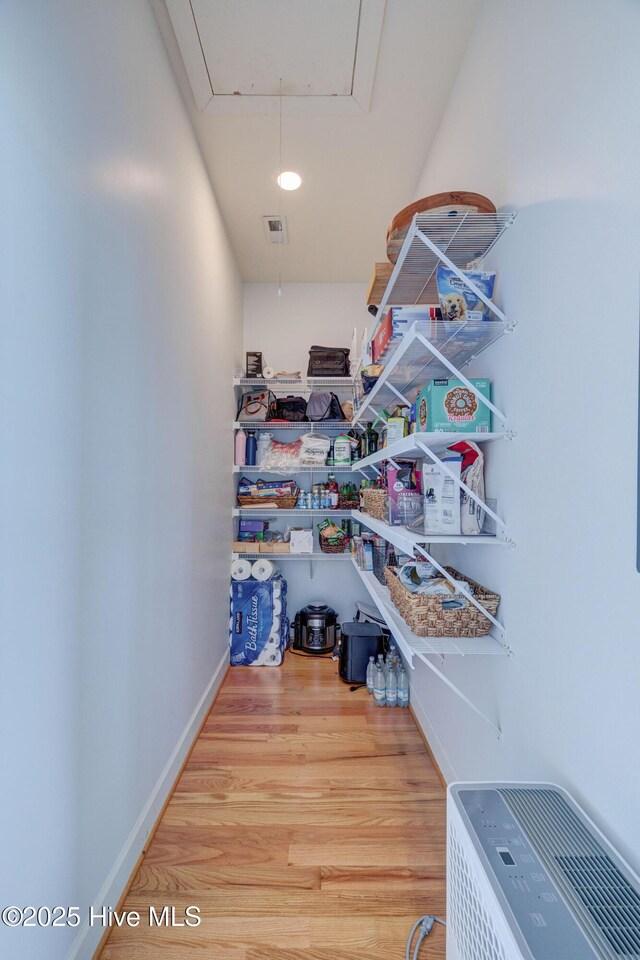 353 Spicer Lake Dr, Holly Ridge, NC 28445 - storage room with attic access and heating unit