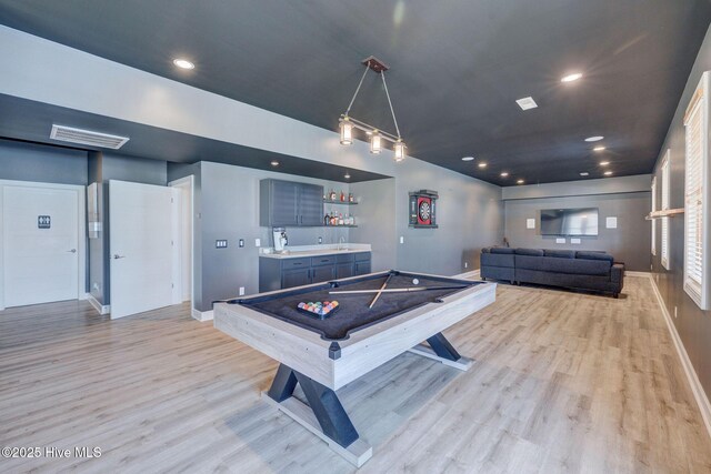 353 Spicer Lake Dr, Holly Ridge, NC 28445 - rec room featuring bar with sink, light wood-style flooring, baseboards, pool table, and recessed lighting