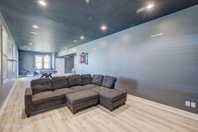 353 Spicer Lake Dr, Holly Ridge, NC 28445 - living room with wood finished floors, baseboards, and recessed lighting