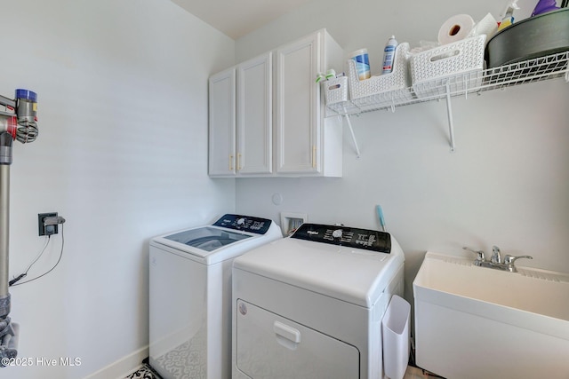 353 Spicer Lake Dr, Holly Ridge, NC 28445 - laundry room with cabinet space, independent washer and dryer, and baseboards