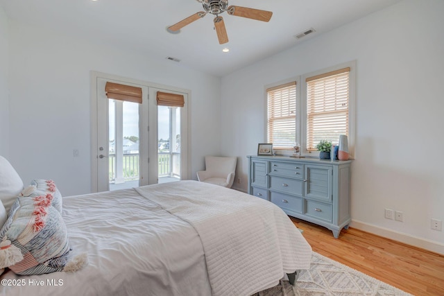 353 Spicer Lake Dr, Holly Ridge, NC 28445 - bedroom featuring access to outside, baseboards, light wood-type flooring, a ceiling fan, and recessed lighting