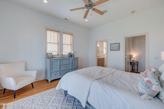 353 Spicer Lake Dr, Holly Ridge, NC 28445 - bedroom with light wood-type flooring, baseboards, recessed lighting, ensuite bath, and a ceiling fan