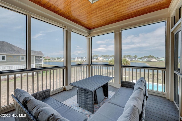 353 Spicer Lake Dr, Holly Ridge, NC 28445 - sunroom with a water view, an outdoor living space, and a residential view