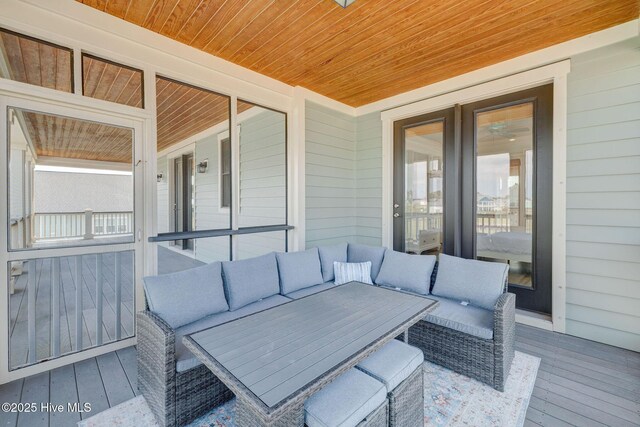 353 Spicer Lake Dr, Holly Ridge, NC 28445 - deck featuring an outdoor living space