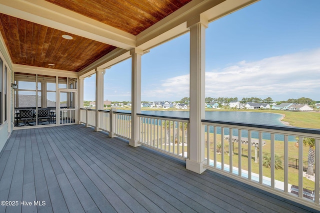353 Spicer Lake Dr, Holly Ridge, NC 28445 - wooden deck featuring a water view