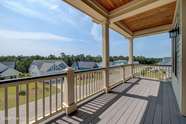 353 Spicer Lake Dr, Holly Ridge, NC 28445 - wooden terrace featuring a residential view and view of wooded area