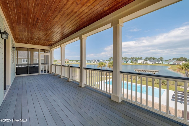 353 Spicer Lake Dr, Holly Ridge, NC 28445 - wooden terrace with a water view